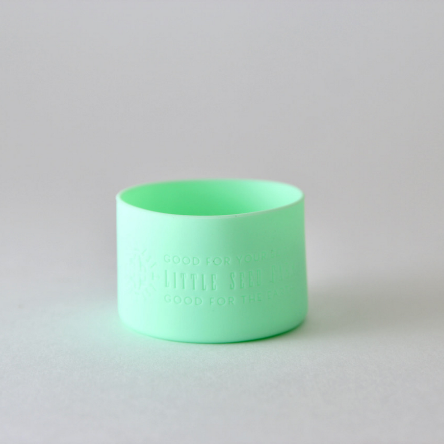 Fillaree Little Seed Farm Silicone Protector Sleeve: Made from 100% FDA food-grade silicone, this durable, non-toxic sleeve protects Little Seed Farm deodorant and balm jars from drops and chipping. The stretchy design with an air vent allows easy jar insertion and removal. Available in ten stylish colors, it reduces single-use plastic waste, offering an eco-friendly and practical solution for home or travel.