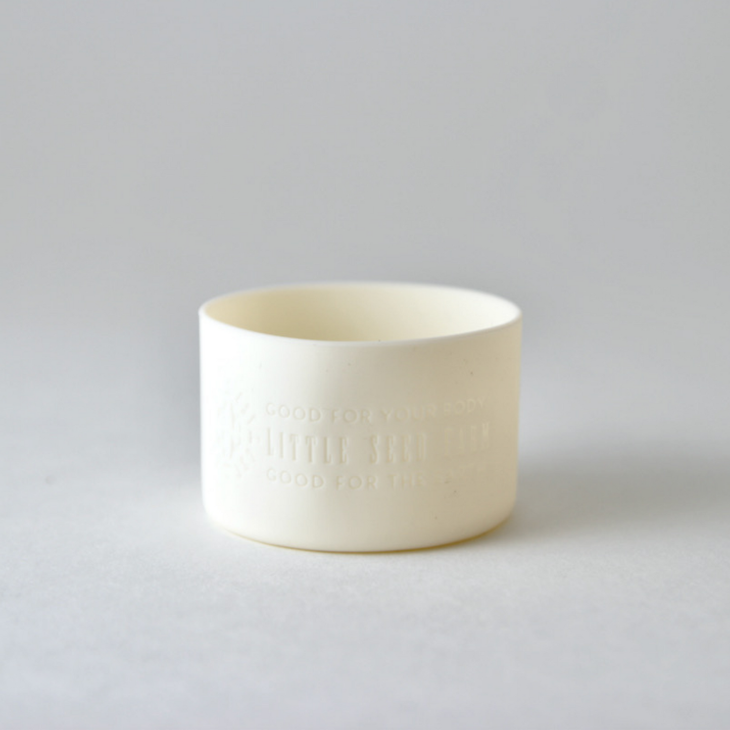 Fillaree Little Seed Farm Silicone Protector Sleeve: Made from 100% FDA food-grade silicone, this durable, non-toxic sleeve protects Little Seed Farm deodorant and balm jars from drops and chipping. The stretchy design with an air vent allows easy jar insertion and removal. Available in ten stylish colors, it reduces single-use plastic waste, offering an eco-friendly and practical solution for home or travel.