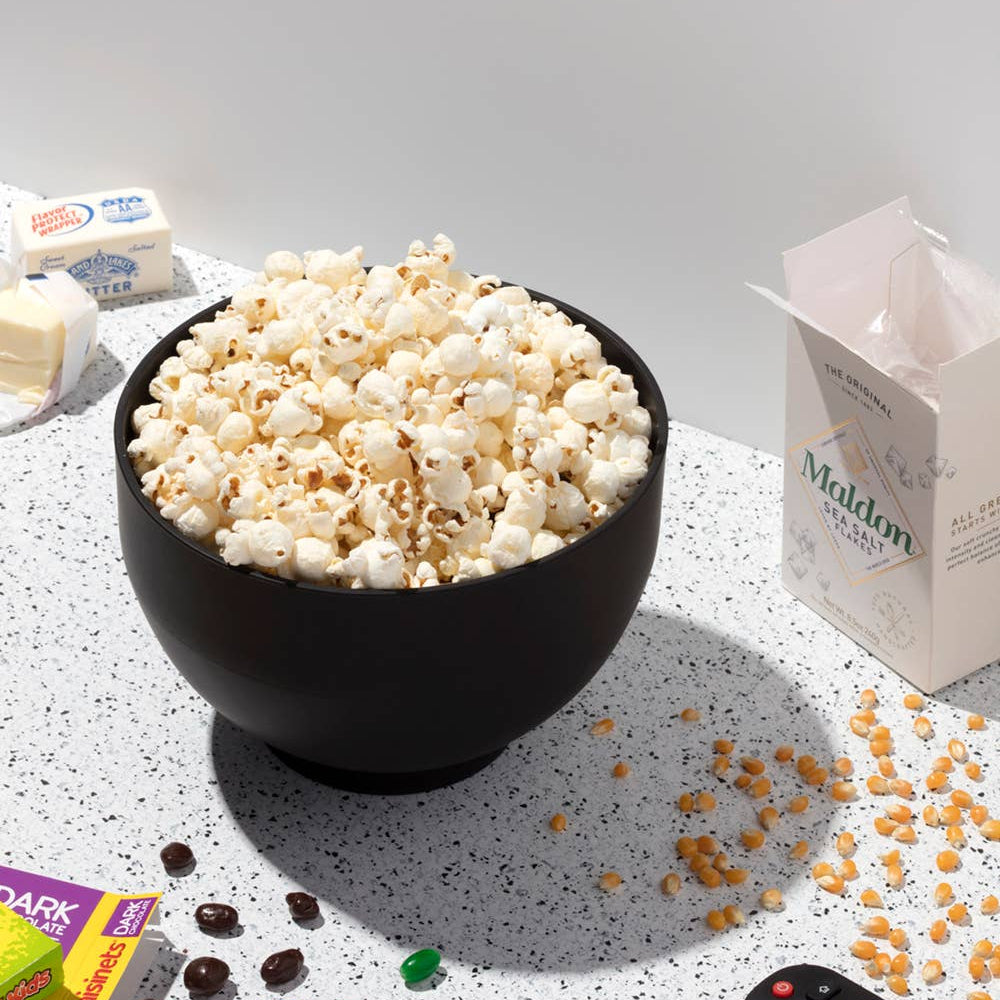 W&P Popcorn Popper—an eco-friendly, collapsible silicone bowl that makes 9 cups of fresh popcorn in just minutes. Features a built-in measuring lid for easy portioning and is microwave and dishwasher safe. Perfect for mess-free, waste-free snacking with your favorite seasonings and toppings