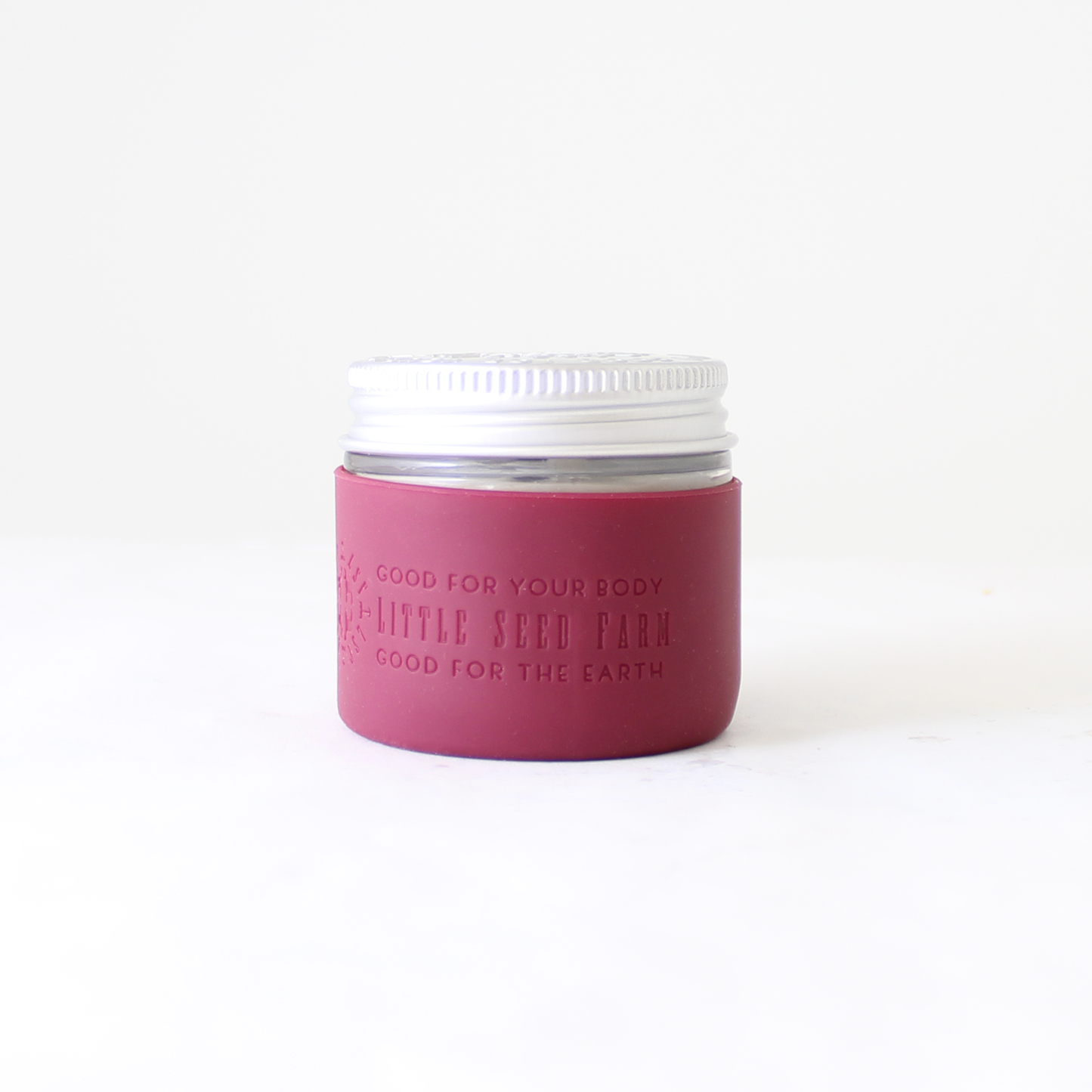Fillaree Little Seed Farm Silicone Protector Sleeve: Made from 100% FDA food-grade silicone, this durable, non-toxic sleeve protects Little Seed Farm deodorant and balm jars from drops and chipping. The stretchy design with an air vent allows easy jar insertion and removal. Available in ten stylish colors, it reduces single-use plastic waste, offering an eco-friendly and practical solution for home or travel.